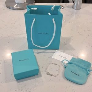 Never worn, brand new, Tiffany Infinity bracelet
